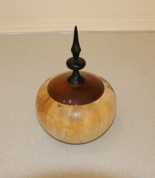 A lidded pot by Nick Adamek